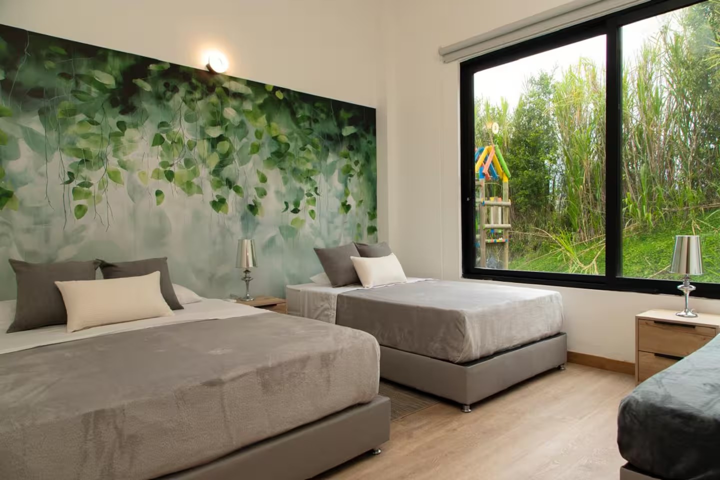 Garden-view bedroom with botanical wall art